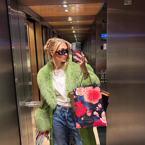 Damen Oversized Kunstpelzjacke mit voluminösen Ärmeln EB