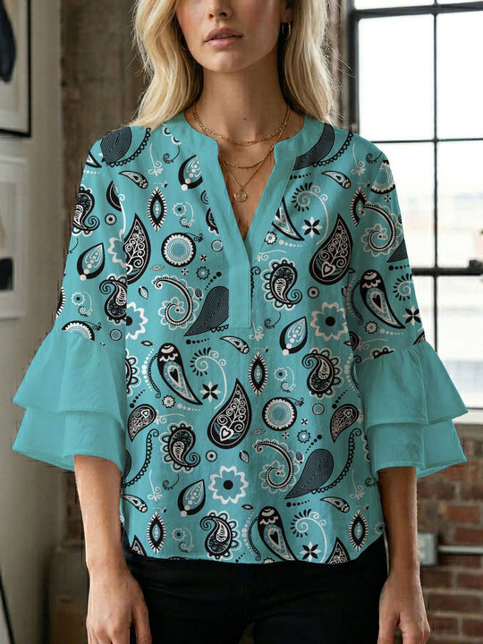 Damen Bluse mit voluminösen Flügelärmel und intensivem Blattmuster EB