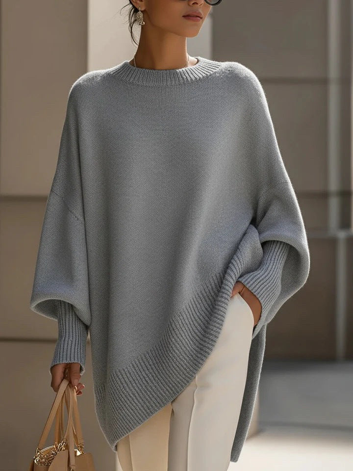 Damen nan Oversize Strickponcho mit asymmetrischem Saum und gerippten Ärmeln EB