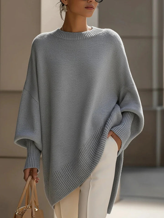 Damen nan Oversize Strickponcho mit asymmetrischem Saum und gerippten Ärmeln EB