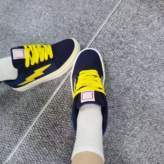 Damen Sportliche Sneakers im modernen Design mit aufwendigem Blitzmotiv EB