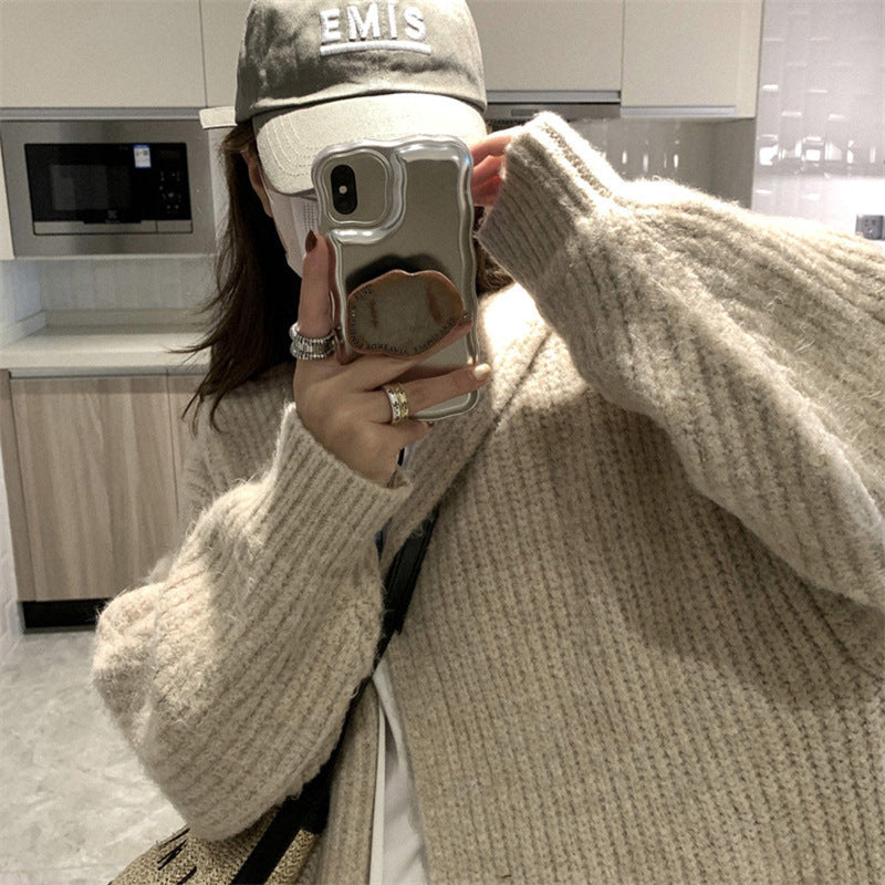 Damen Langstrickjacke mit eleganter Rippstruktur und praktischen Taschen EB