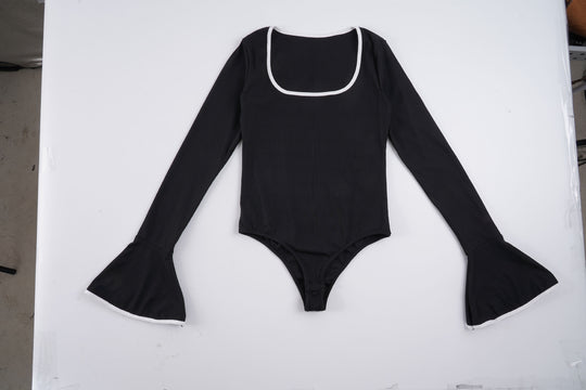 Damen Body mit langen Ärmeln und elegantem Rüschenabschluss EB