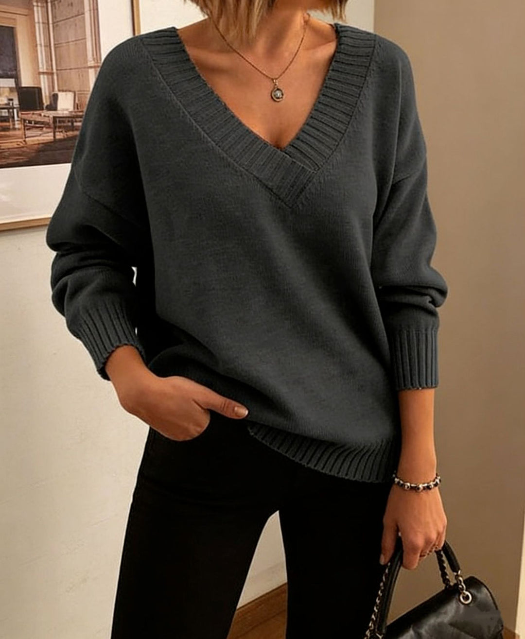Damen Feinstrickpullover mit tiefem V-Ausschnitt und überschnittener Schulter EB
