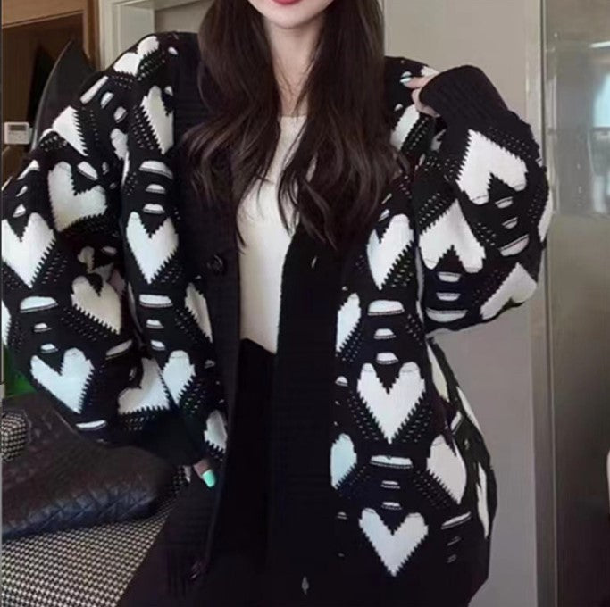 Damen Strickjacke mit einzigartigem Herzmuster und voluminösen Ärmeln EB