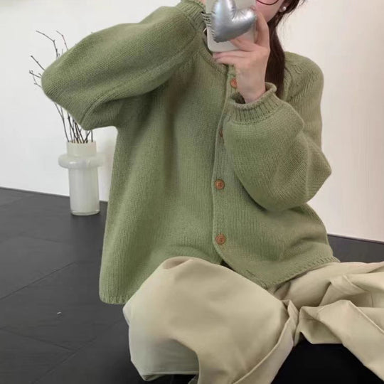 Damen Strickjacke mit asymmetrischem Schnitt und großzügigen Ballonärmeln EB