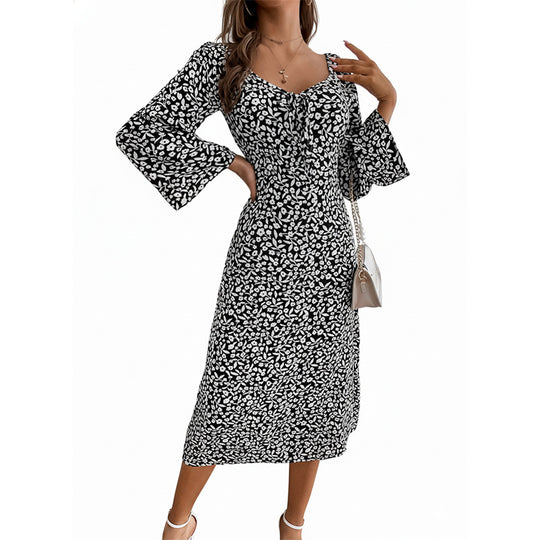 Damen Blumen-Midikleid mit taillierter Wickeloptik und ausgestellten Trompetenärmeln EB