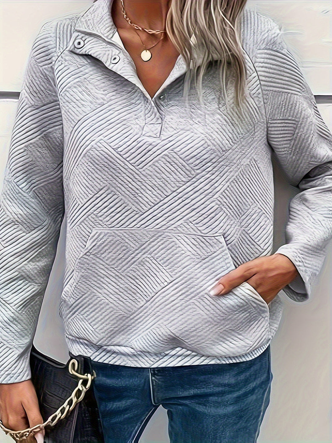 Damen Pullover mit strukturiertem Design und zwei praktischen Taschen EB