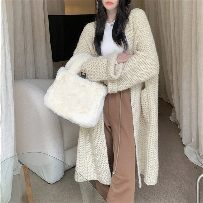 Damen Lange Strickjacke mit praktischen Taschen und modischem Zopfmuster EB