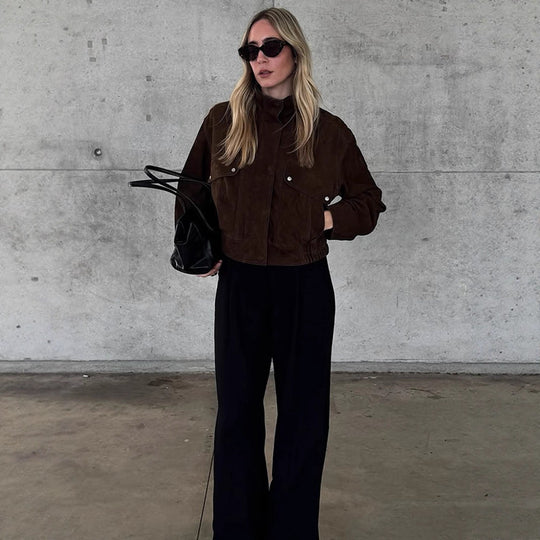 Damen Kunstlederjacke mit strukturiertem Schnitt und praktischen Taschen EB