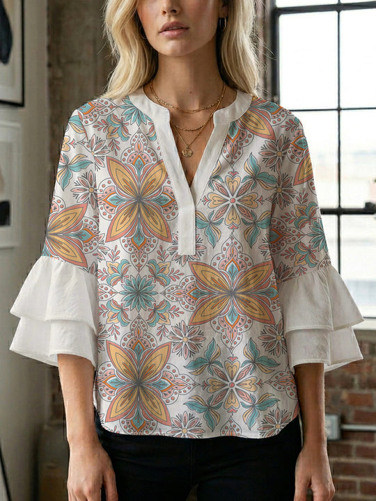 Damen Bluse mit voluminösen Rüschenärmeln und kreativem Floraldesign EB
