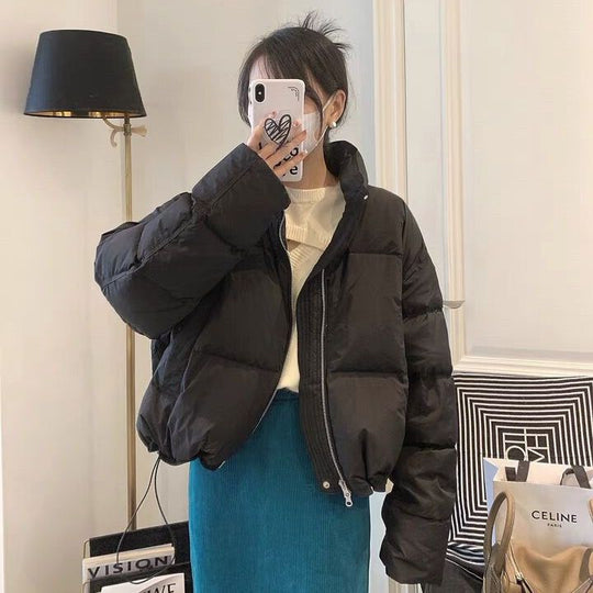 Damen Oversized Pufferjacke mit elastischem Bund und seitlichen Reißverschlusstaschen EB