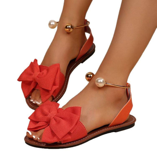 Damen Sandalen mit dekorativem Schleifenakzent und eleganten Perlendetails EB