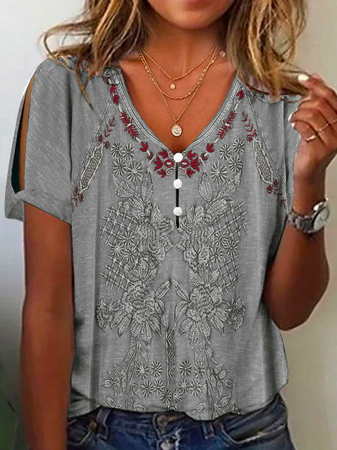 Damen Kurzarmbluse mit floralen Stickereien und Knopfdetails EB