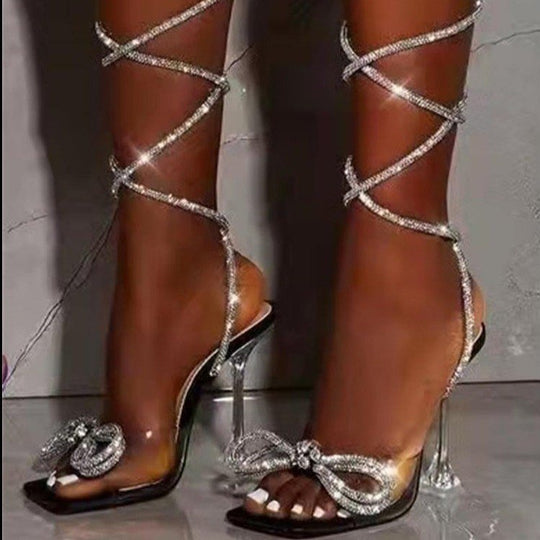 Damen Durchsichtige Absatzsandalen mit funkelndem Riemendesign und Schleifenakzent EB
