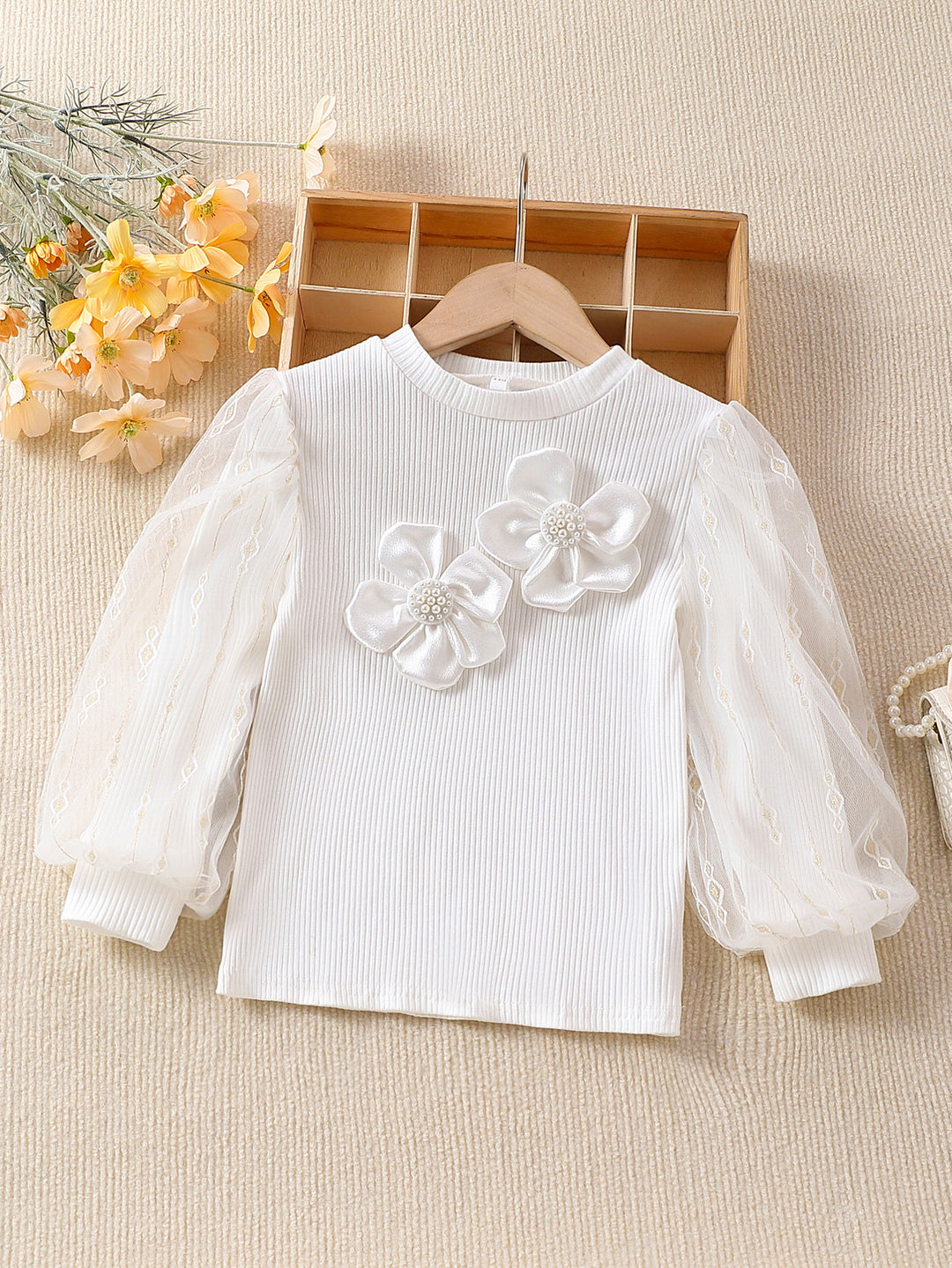 Mädchen modische Bluse mit transparenten Puffärmeln und floralen Akzenten EB