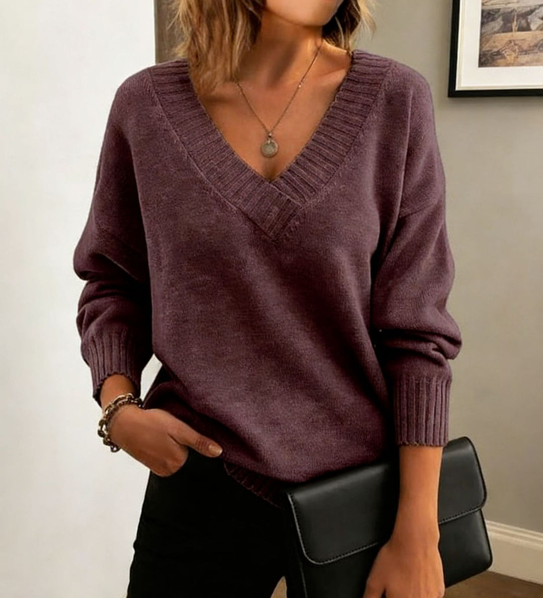 Damen Feinstrickpullover mit tiefem V-Ausschnitt und überschnittener Schulter EB
