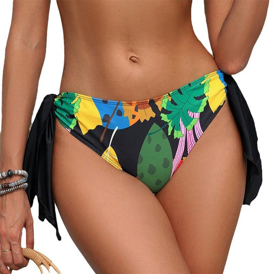 Damen Bikinislip mit verspieltem Seitenschnitt und floralem Design EB