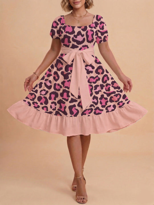 Damen Sommerliches Blumenkleid mit taillierbarem Gürtel und voluminösen Ärmeln EB
