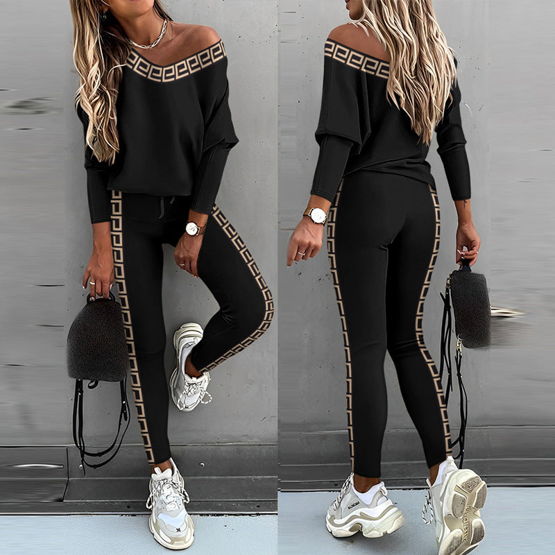 Damen Freizeit Set mit glitzerndem Motiv und offenem Schulterdesign EB