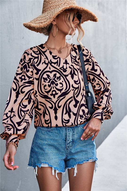Damen Bluse mit elegantem Barockmuster und lässigen Puffärmeln EB