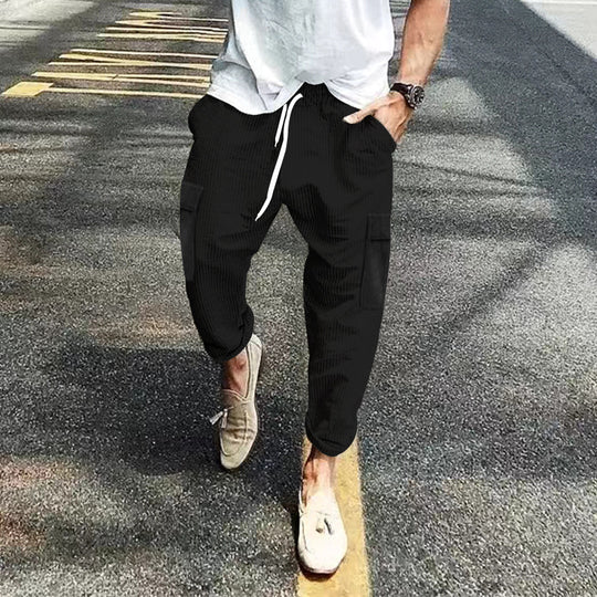 Herren nan Cord-Cargo-Jogginghose mit elastischem Tunnelzugbund, aufgesetzten Klappentaschen und tapered Bein EB