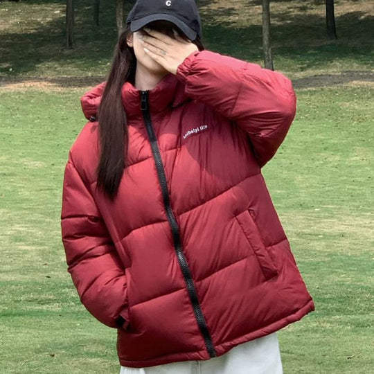 Damen Thermoisolierte Pufferjacke mit verstellbarer Kapuze und seitlichen Taschen EB