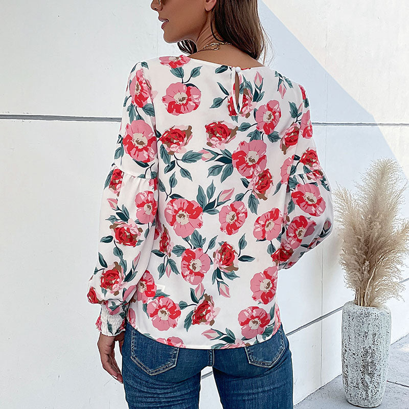 Damen Bluse mit floralen Mustern und voluminösen Ärmeln EB