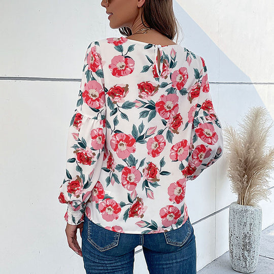 Damen Bluse mit floralen Mustern und voluminösen Ärmeln EB