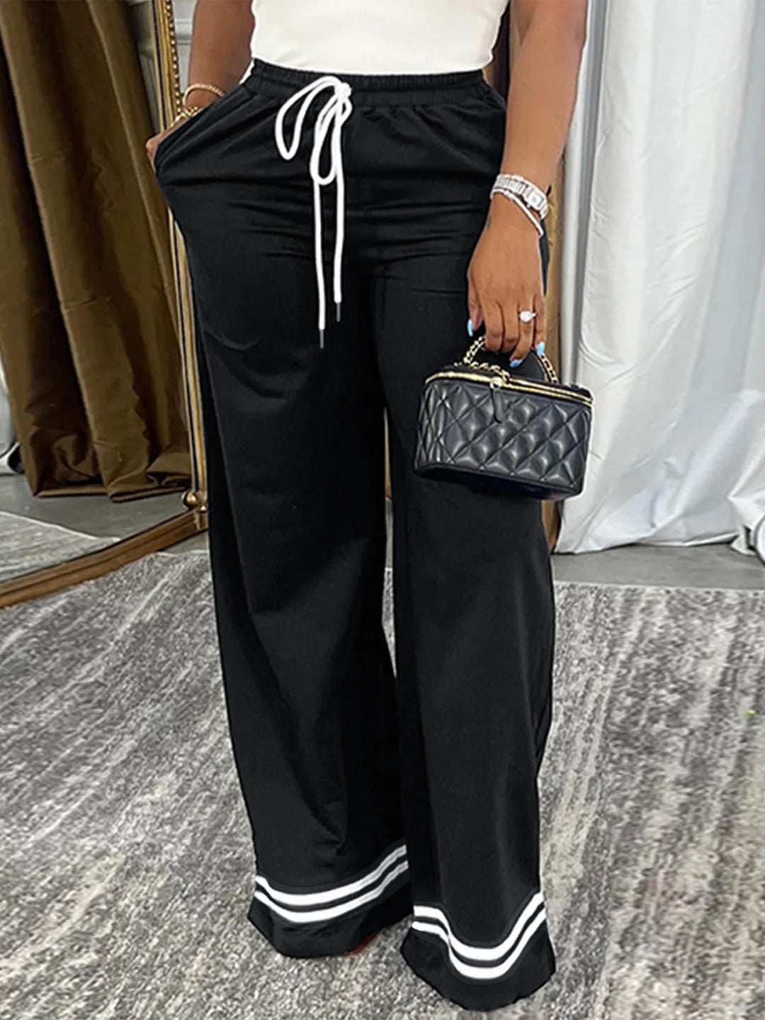 Damen Weite Freizeithose mit elastischem Bund und seitlichen Taschen EB