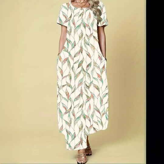 Damen Maxikleid mit lebhaftem Blattmuster und praktischen Taschen EB