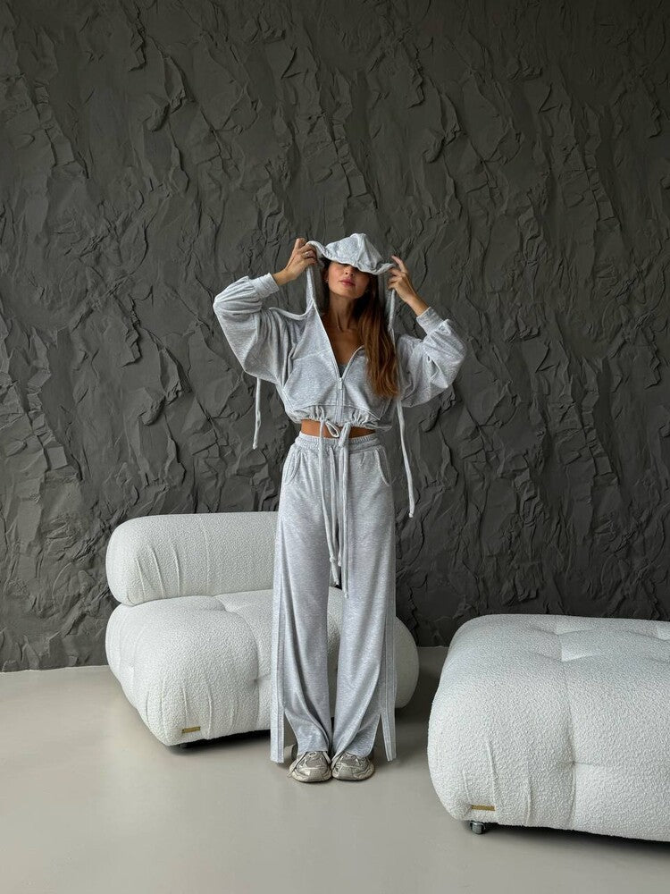 Damen Cropped Kapuzenjacke mit Kordelzug und weitem Split-Hose Lounge-Set Eichborn Berlin