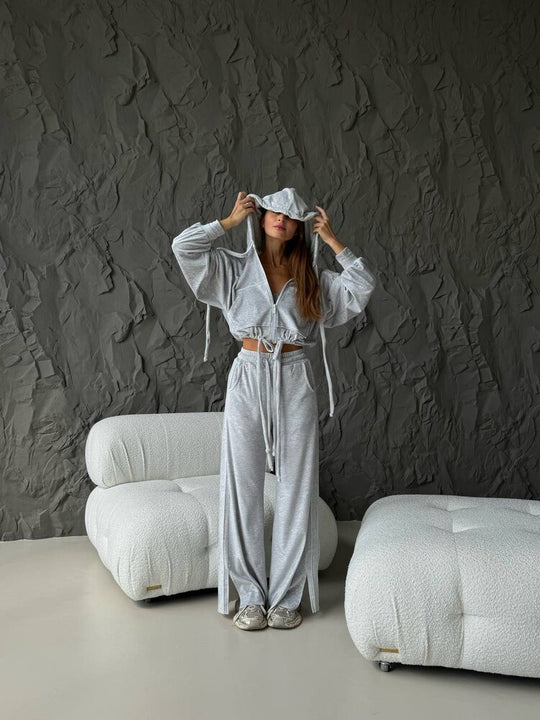Damen Cropped Kapuzenjacke mit Kordelzug und weitem Split-Hose Lounge-Set Eichborn Berlin