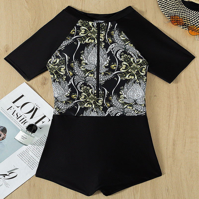 Damen Sporteinteiler mit floralem Design und kurzem Arm EB