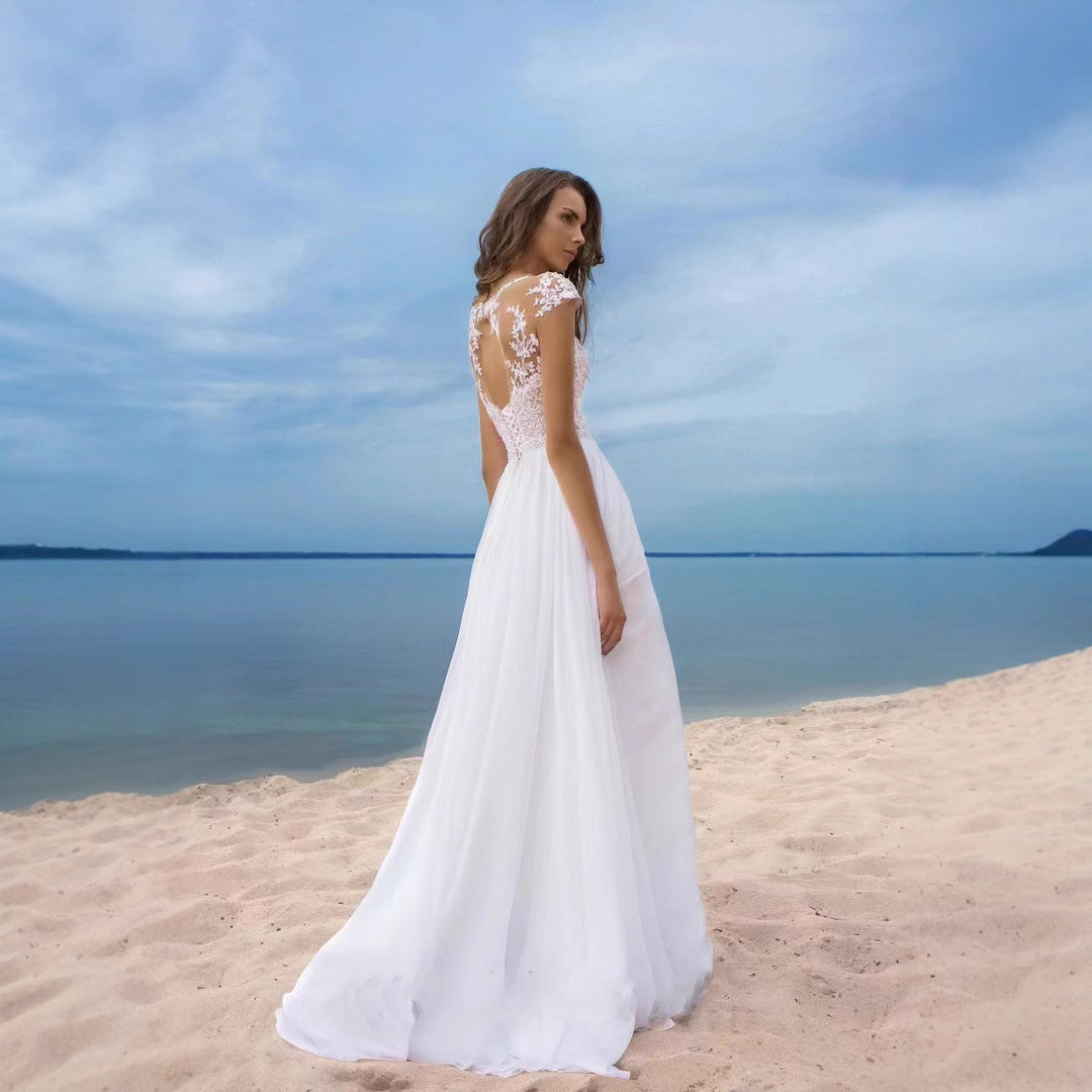 Damen Hochzeitskleid mit elegantem Spitzenoberteil und schwingendem Rock EB
