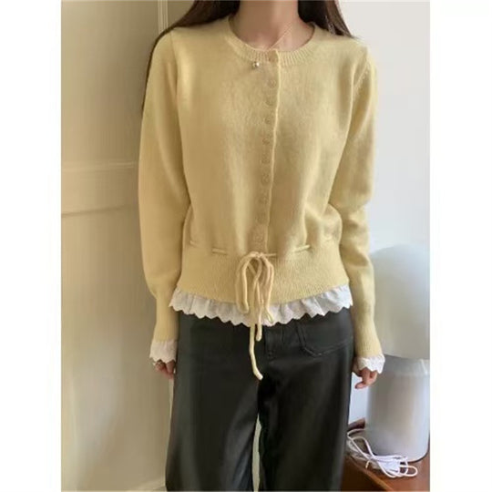 Damen kuscheliger Strickjacke mit fransigen Details und Bändchen EB
