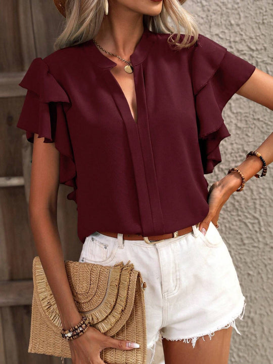 Damenbluse mit Rüschendetails und elegantem V-Ausschnitt EB
