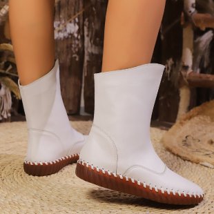 Damen nan knöchelhohe Stretch-Stiefelette mit handgenähter Mokassinnaht und profilierter Leichtlaufsohle EB