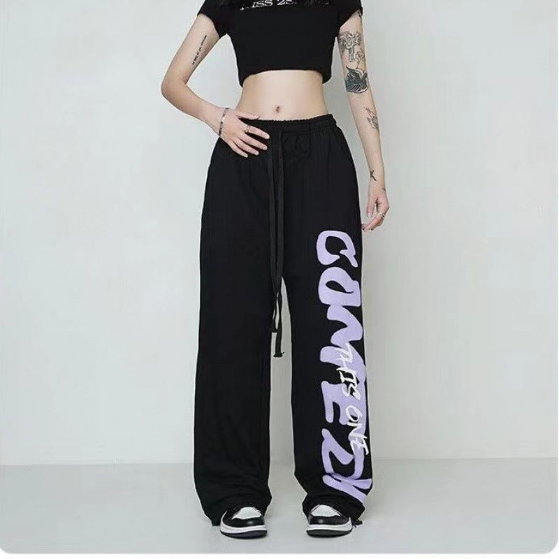 Damen nan weite Lounge-Hose mit elastischem Bund, Kordelzug und markantem Seitengrafikprint EB
