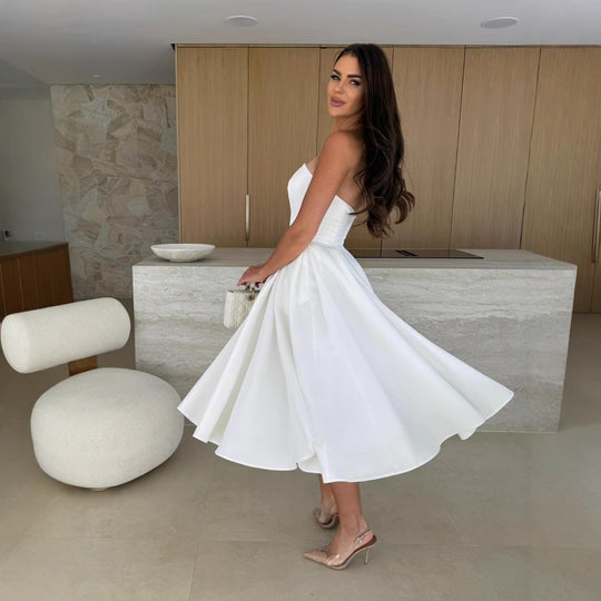 Damen A-linien Cocktailkleid mit trägerlosem Schnitt und schwingendem Rock EB