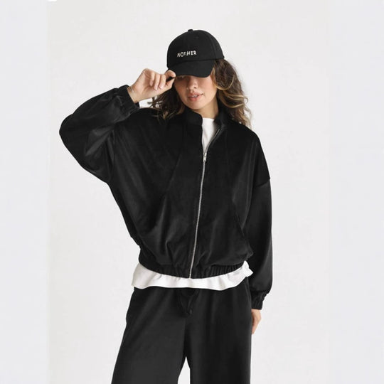 Damen ausgestelltes Velours-Jogginganzug-Set mit kurzer Reißverschlussjacke und hochtaillierter Kordelhose Eichborn Berlin