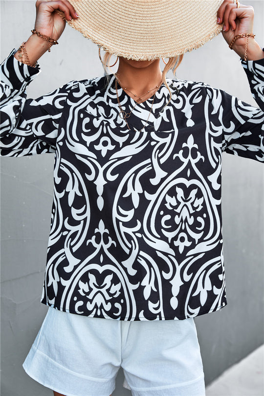 Damen Bluse mit elegantem Barockmuster und lässigen Puffärmeln EB