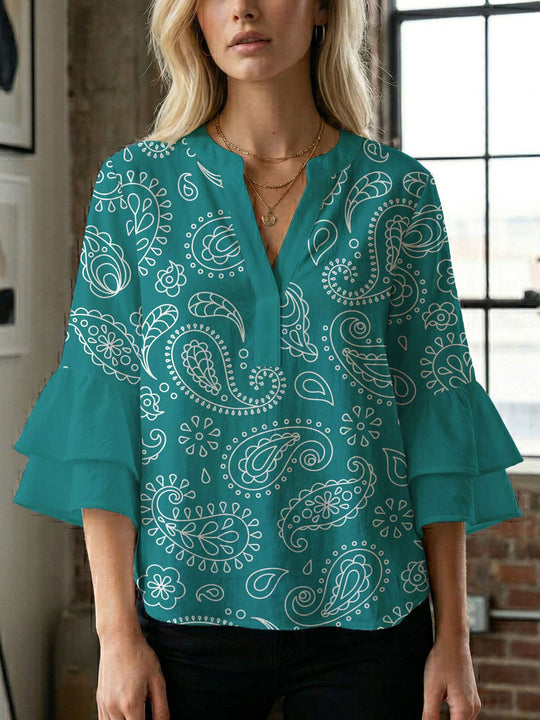 Damen Bluse mit voluminösen Flügelärmel und intensivem Blattmuster EB