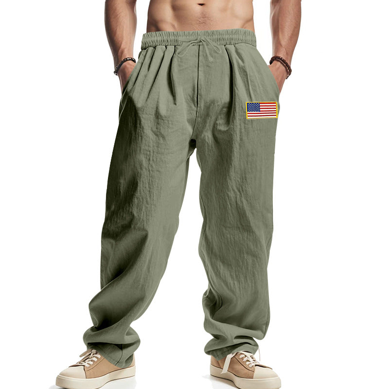 Herren Locker sitzende Freizeit-Hose im Leinen-Look mit elastischem Bund, Kordelzug & Flaggenpatch EB