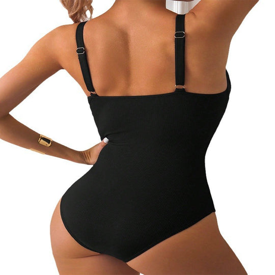 Damen Einteiler Badeanzug mit modischem Cut-Out und zierlichen Schmuckdetails EB