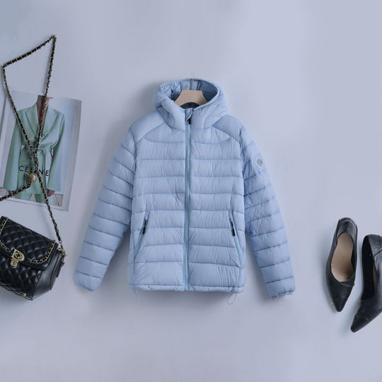 Damen nan ultraleichte gesteppte Kapuzenjacke mit thermoisolierender Füllung und taillierbarem Tunnelzug EB