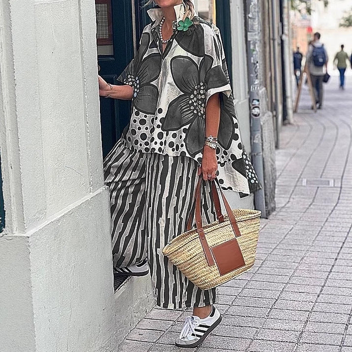 Damen Übergroßes Tunika-Set mit floralem Muster und gestreiften Hosen EB