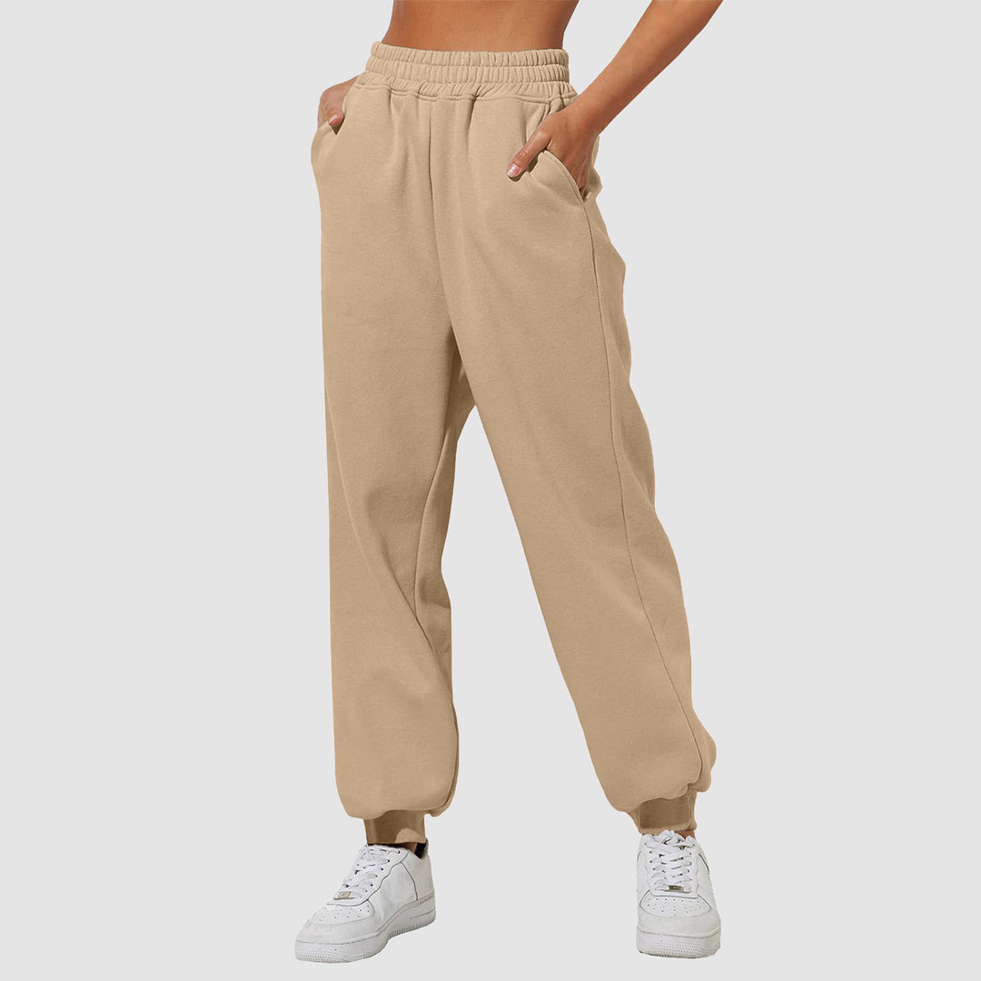 Damen nan weite High‑Waist Jogginghose mit soften Bügelfalten, elastischem Komfortbund und gerippten Knöchelbündchen EB