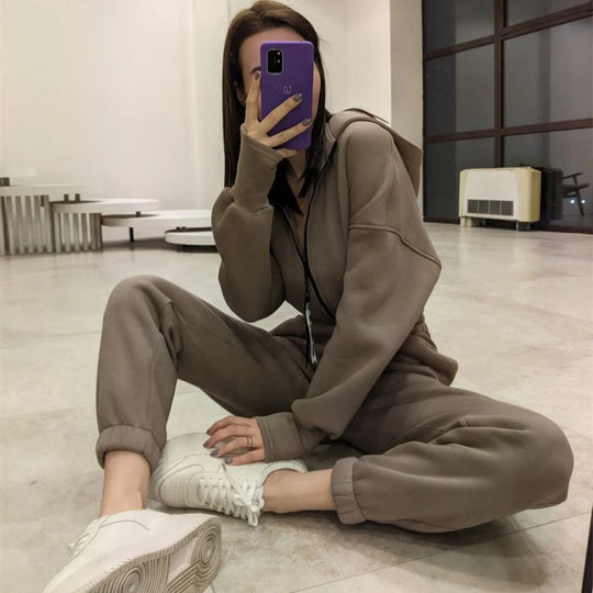 Damen Taillierter Kapuzen-Sweat-Jumpsuit mit Reißverschluss und elastischem Taillenbund EB