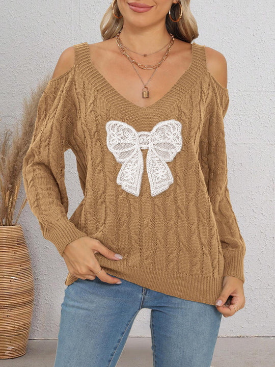 Damen modischer Pullover mit verspielt eingestricktem Schleifenmotiv EB